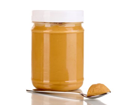 kavanozun üzerine beyaz izole lezzetli fıstık ezmesi