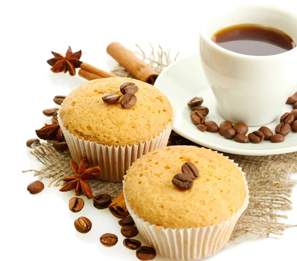 Tasty muffin cakes with spices on burlap and cup of coffee — Stock Photo, Image