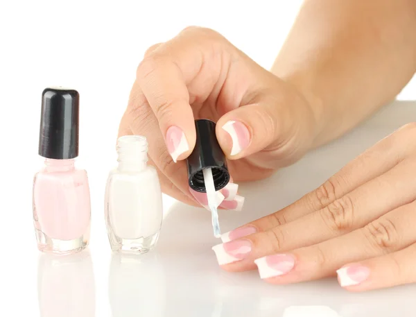 Woman makes herself a French manicure, on white background — Stock Photo, Image