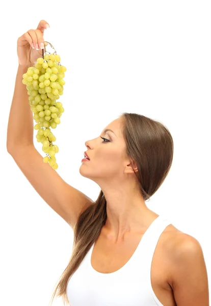 Hermosa joven con uva, aislada en blanco — Foto de Stock