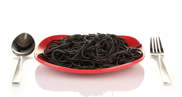 Black spaghetti isolated on white — Stock Photo, Image