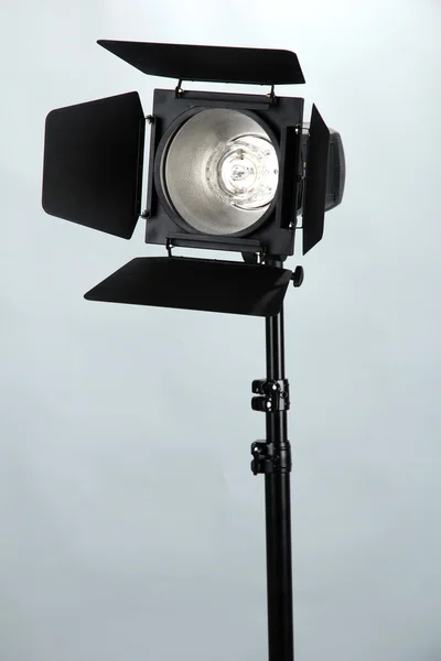 Studio lighting on grey background close-up — Stock Photo, Image