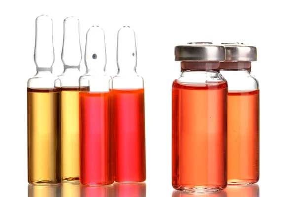 Ampollas médicas con líquido brillante, aisladas en blanco —  Fotos de Stock