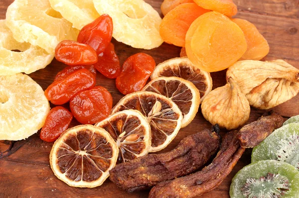 Dried fruits on wooden background — Stock Photo, Image