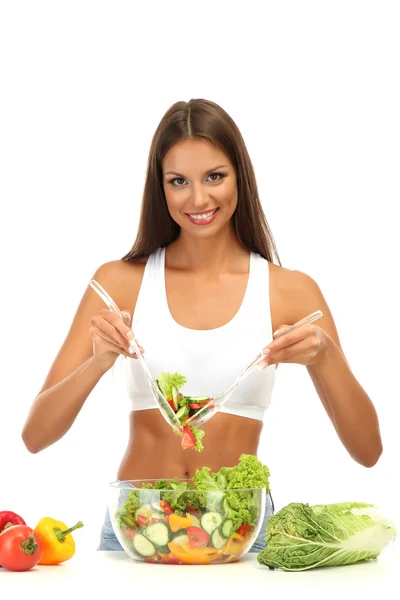 Beautiful young woman with salad, isolated on white — Stock Photo, Image