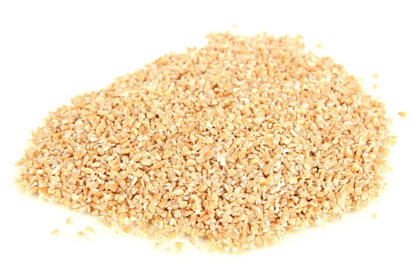 Купа висівок пшениці ізольована на білому — стокове фото