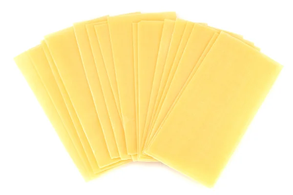 Lasagne crude isolate su bianco — Foto Stock