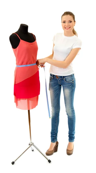 Mooie jonge vrouw en mannequin geïsoleerd op wit — Stockfoto