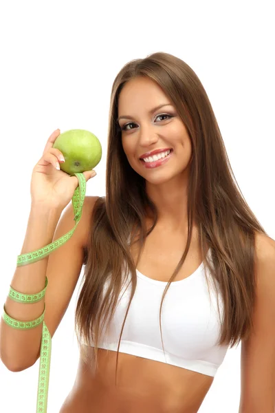 Krásná mladá žena zelené jablko a měření páskou, izolované na bílém — Stock fotografie