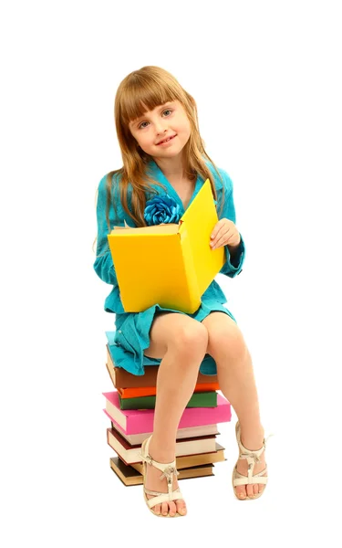 Bambina con un libro isolato su bianco — Foto Stock