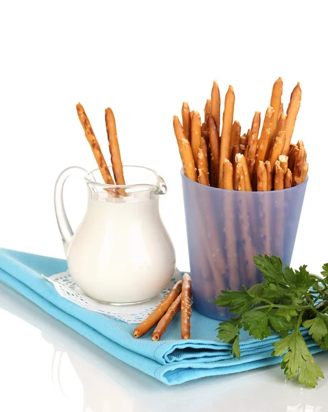 Tasty crispy sticks in purple plastic cup isolated on white — Stock Photo, Image