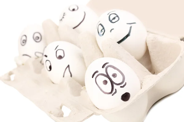 White eggs with funny faces — Stock Photo, Image
