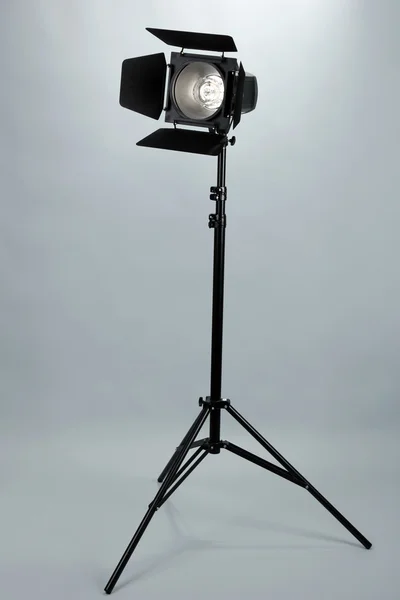 Studio lighting on grey background close-up — Stock Photo, Image