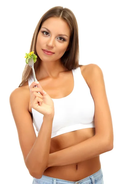Hermosa joven con ensalada en tenedor, aislado en blanco —  Fotos de Stock