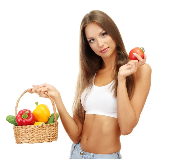 Beautiful young woman with vegetables in basket, isolated on white — Stock Photo, Image