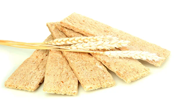 Biscotti di avena e spighe di grano isolate su bianco — Foto Stock