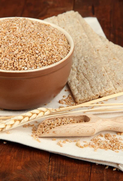 Wheat bran on the table — Stock Photo, Image