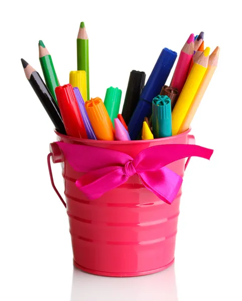 Colorful pencils and felt-tip pens in pink pail isolated on white — Stock Photo, Image