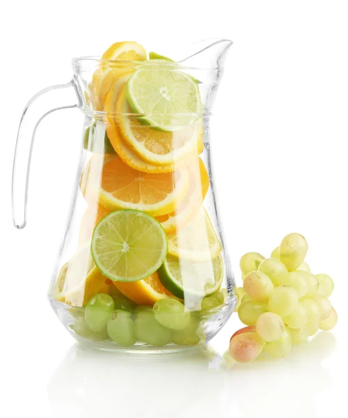 Transparent jar with citrus fruits and grape, isolated on white — Stock Photo, Image