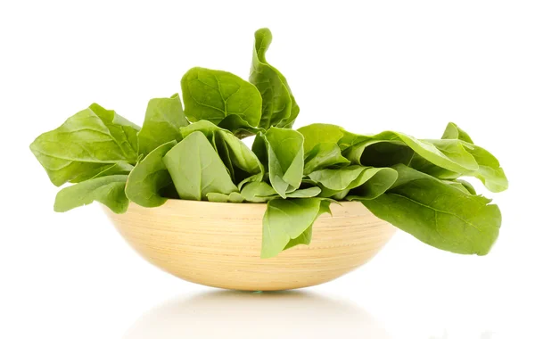 Fresh spinach in wooden bowl isolated on white — Stock Photo, Image