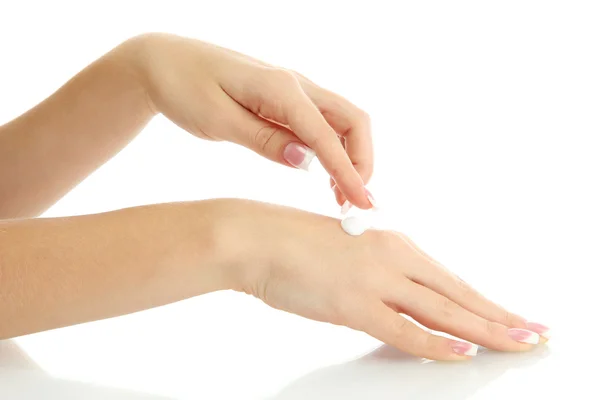 Красиві жіночі руки з кремом, ізольовані на білому — стокове фото