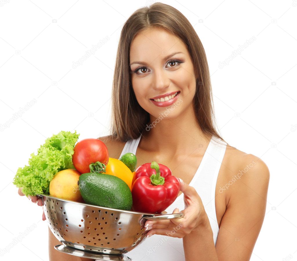 beautiful young woman with vegetables in colander, isolated on white