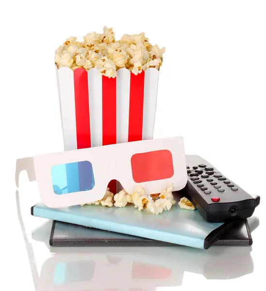 Popcorn con pannello di controllo TV e dischi isolati su bianco — Foto Stock