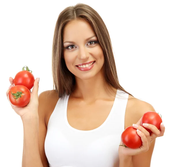 Mooie jonge vrouw met tomaten, geïsoleerd op wit — Stockfoto