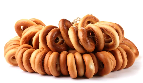 Bagels saborosos na corda, isolados no branco — Fotografia de Stock