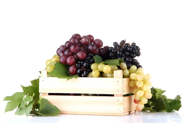 Assortment of ripe sweet grapes in wooden crate, isolated on white — Stock Photo, Image