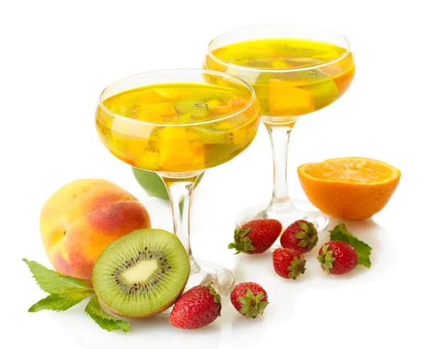 Punch in glasses with fruits, isolated on white — Stock Photo, Image