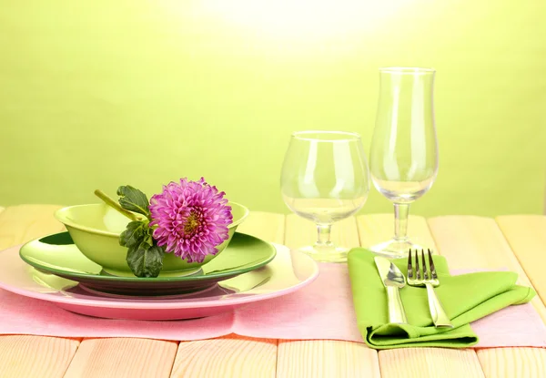 Table setting on bright background close-up — Stockfoto