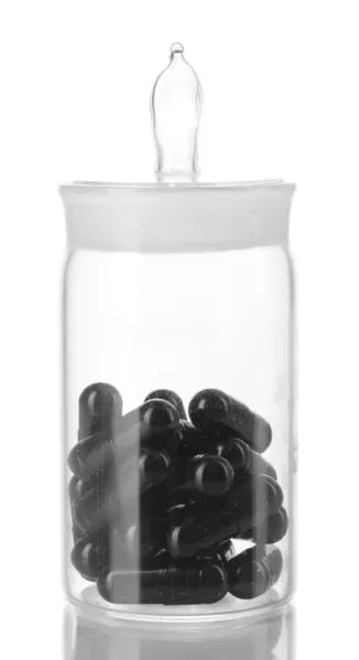 Transparente Flasche mit Pillen isoliert auf weiß — Stockfoto