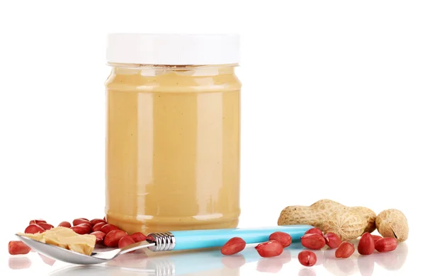 Delicious peanut butter in jar isolated on white — Stock Photo, Image