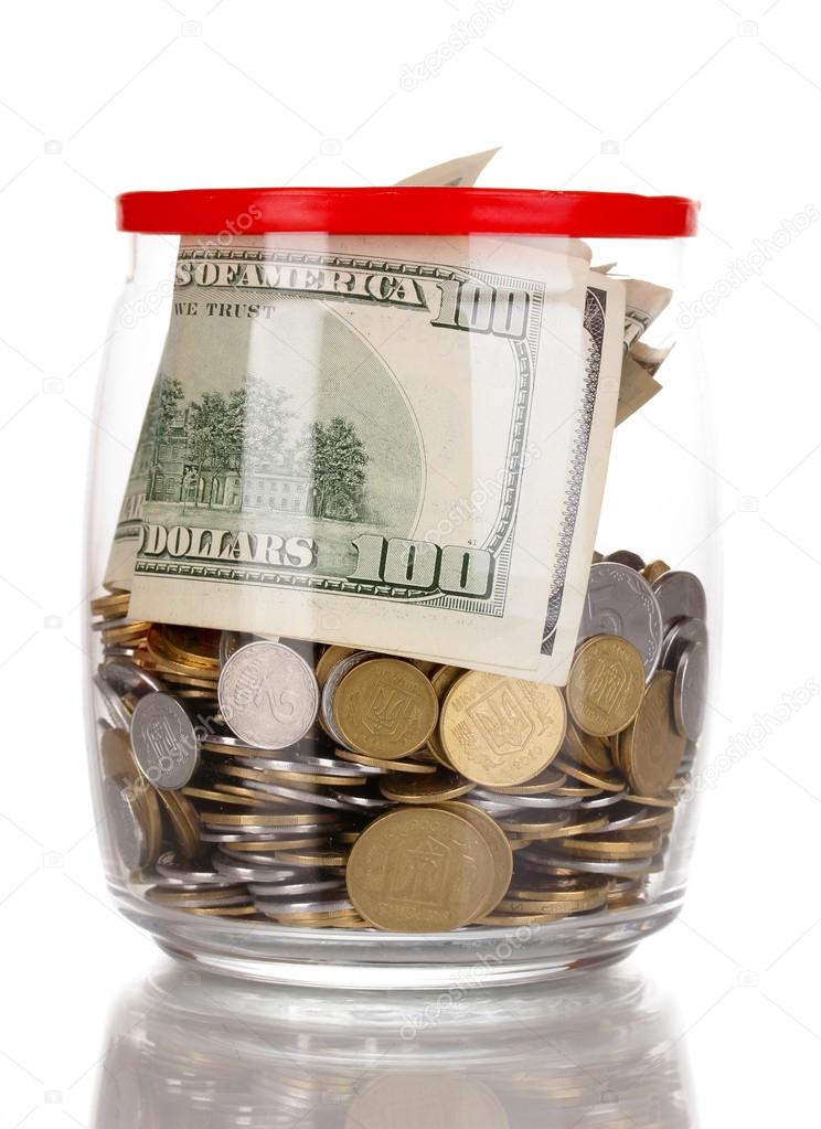 Clear glass jar for tips with money isolated on white