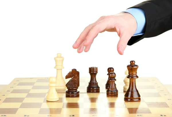 Empresário jogar xadrez isolado no branco — Fotografia de Stock