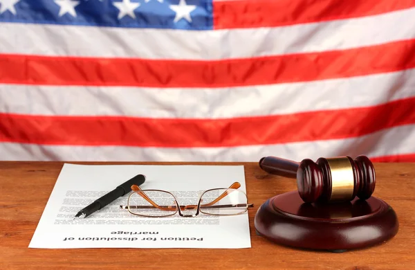 Divorce decree and wooden gavel on american flag background — Stock Photo, Image