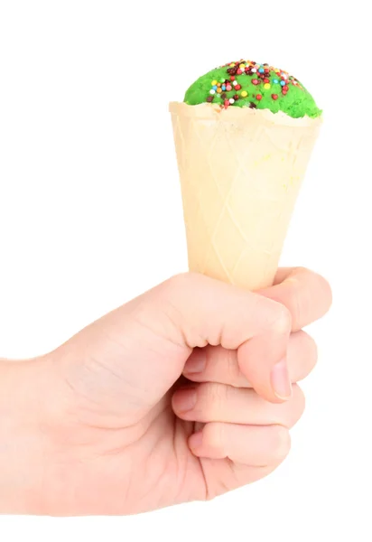 Scoop of kiwi ice cream in the waffle cone decorated with sprinkles — Stock Photo, Image