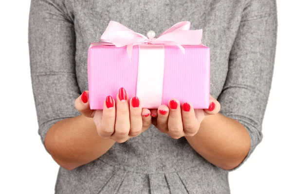 Woman holds box with gift on white background close-up — Stockfoto