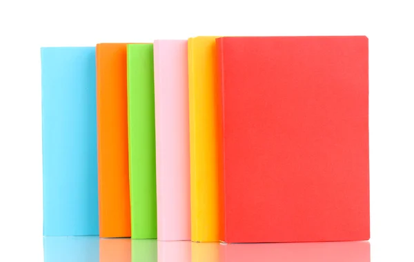 Çok renkli kitap üzerinde beyaz izole yığını — Stok fotoğraf
