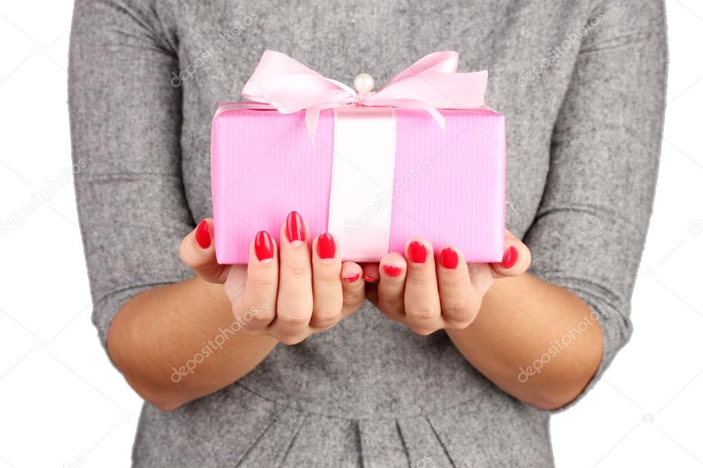 woman holds box with gift on white background close-up