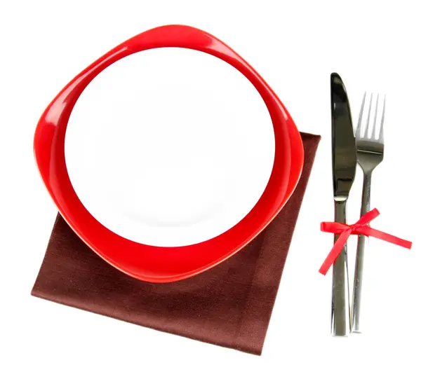 Empty red and white plates with fork and knife isolated on white — Stock Photo, Image