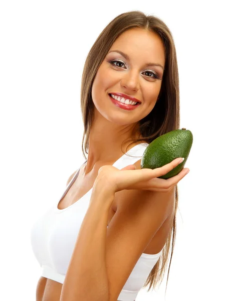 Bella giovane donna con avocado, isolata su bianco — Foto Stock