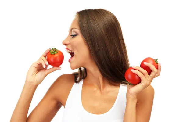 Güzel genç kadın üzerinde beyaz izole domates ile — Stok fotoğraf