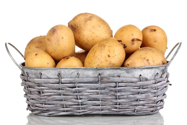Ripe potatoes on basket isolated on white — Stock Photo, Image