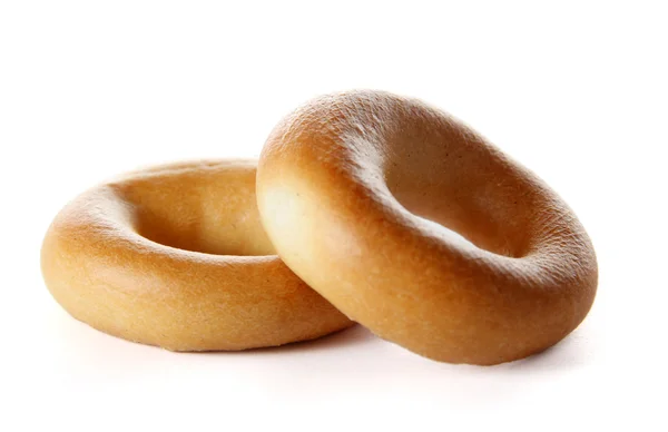 Smakelijke bagels, geïsoleerd op wit — Stockfoto