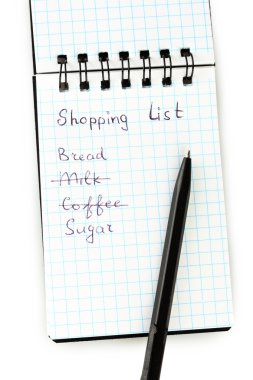 bir defter üstünde beyaz arka plan yakın çekim alışveriş listesi