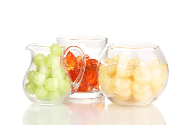 Color candies in glasses isolated on white — Stock Photo, Image