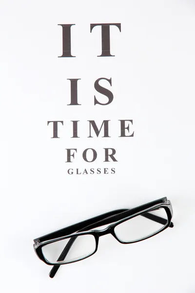 Eyesight test chart with glasses close-up — Stock Photo, Image