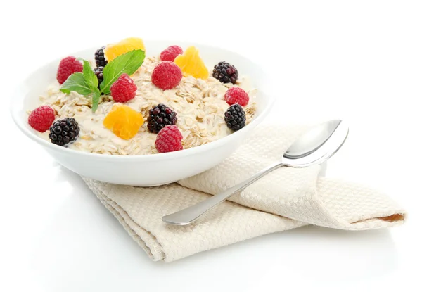 Tasty oatmeal with berries, isolated on white — Stock Photo, Image